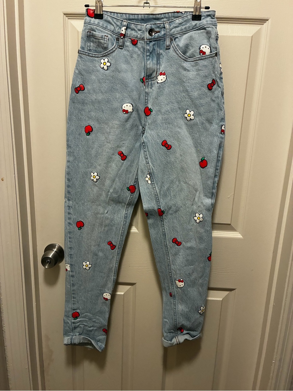 Hello Kitty Light Wash Straight Leg Jeans with Red & White Motifs